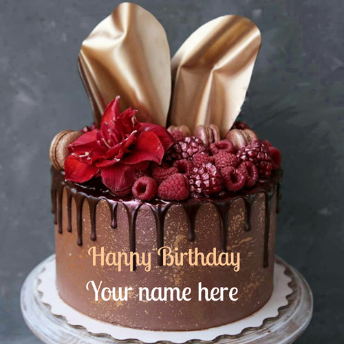 Chocolate Birthday Cake With Strawberry Toppings On It
