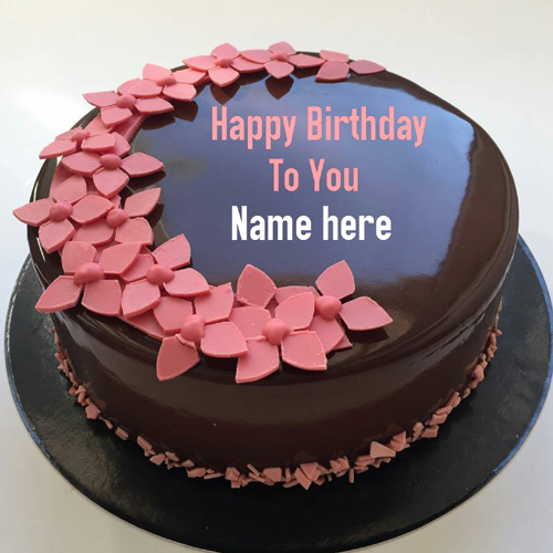 Chocolate Birthday Name Cake With Flowers On It